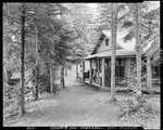 People On Porch Of A Cabin At Moosehead Lake by George French