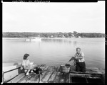 Lobster Dealer Holding A Lobster While A Young Girl Looks It Over In North Edgecomb by George French