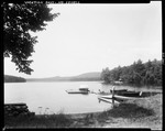 Couple Getting Ready To Go Boating On A Lake In North Lovell by George French