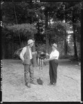 Two Men Standing In The Woods Holding A Stringer Of Fish In Parsonsfield by George French
