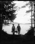 Two Men Walking Away From Lake Shore At Sunset After A Day Of Fishing In Parsonsfield by George French
