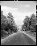 Dirt Road Through Countryside Of Parsonsfield, Farm In Distance by George French