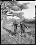 Two Hunters Tagging A Buck In Parsonsfield by George French