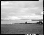 View Of Lake And Mountains In Rangeley, Very Cloudy Sky by George French