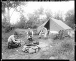Three Men Cooking By A Campfire At Rockwood Near Greenville by George French