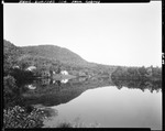 Trees, Houses And Mountain Reflected In Pond In Rumford Center by George French