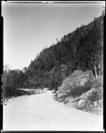 Gravel Road Along The Base Of A Cliff At South Arm, 1947 - 1948
