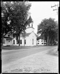 Church Beside Road Between Two Houses In Unity by George French
