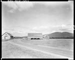 Barns On A Country Road In Coplin, Mountains In Background by George French