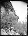 Two Men And A Dog Sitting On A Rock At The Base Of A Mountain In Fryeburg by George French