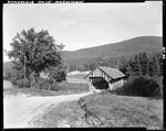 Overall View Of Covered Bridge, Trees, Road And Mountains In Magalloway by George French