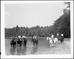 Group Of Riders At Edge Of Lake, Half Of Group In Water by George French