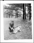 Hunter Tagging A Ten Point Buck by George French