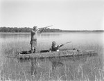 Two Duck Hunters In A Camouflaged Boat On Merrymeeting Bay by George French