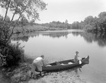A Couple Getting Into A Canoe At Great Ossipee by George French