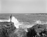 Man Standing On A Rocky Shore by George French