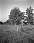 Hunter And His Dog Crossing A Field by George French