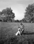 Hunter And Her Dog In A Field by George French