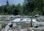 Man Fishing Near A Small Waterfall On The Swift River In Passaconway, New Hampshire by George French