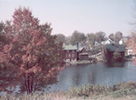 Fall Foliage And Buildings Around A Pond In Ashland by George French
