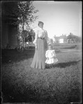 Outdoor Portrait Of Woman (Josie Ridlon) With Young Child by George French