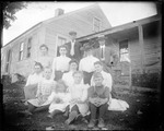 Unidentified Family Group Outside Their Rural Home by George French