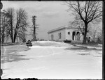 Winter Scene With An Unidentified Institutional Looking Stone Building by George French