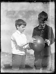 Two Young Boys With A Balloon by George French