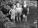 Three Young Girls Standing Knee Deep In A Stream by George French