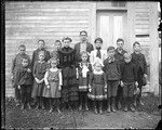 School Group Gathered In Front Of Their School House by George French