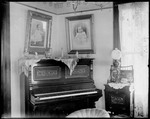 Interior Of A Parlor Showing Portraits And A Piano by George French