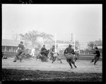 Tackel Play During A Football Game by George French