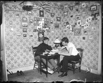 Two Young Men In A Dorm Room Studying by George French