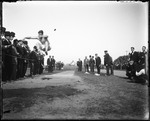 Long Jumper In Mid-air At A Track Meet by George French