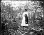 Full Length Portrait Of A Woman (Alice) In The Woods Wearing Her Graduation Outfit by George French