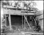 Group Of Men Shingling The Roof Of An Old, Rural House by George French