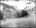 George French Playing Golf In A Field by George French