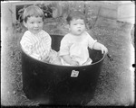 Two Young Children Sitting In A Tub by George French