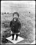 Young Child Standing On A Box by George French