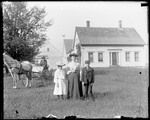 Family Posed Standing Outside Their Rural Farm House by George French