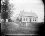 Family Posed Standing Outside Their Rural Farm House by George French