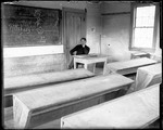 George French Sitting In A Kezar Falls School Classroom by George French