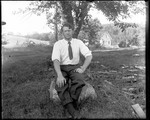 George French Sitting On A Rock by George French