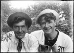 Close-up Portrait Of George French And Brother Ern With Cat by George French