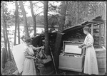 Split Image, Margaret Washing Clothes & Putting Food In An Ice Chest At A Lake by George French
