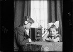 Young Boy And Girl Listening To A 'wireless' Radio by George French