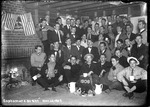 Large Group Of Male College Students Gathered In A Bates Dorm Room by George French