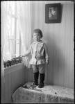 Young Boy With Toy Train By Window by George French