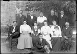 Large Family Group Posed Outside Their Home by George French