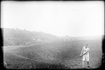 George French Standing In A Field Ready To Throw The Hammer by George French